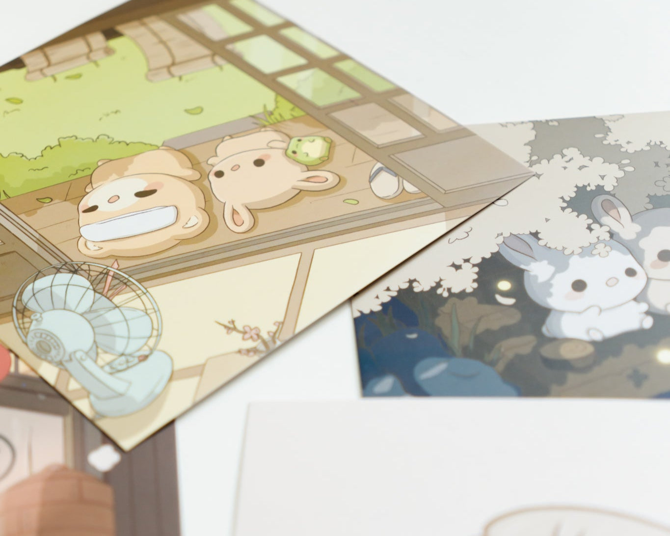 a 5.5"x5.5" square art print featuring a cute bear, bunny, and frog cooling off on a hot day.