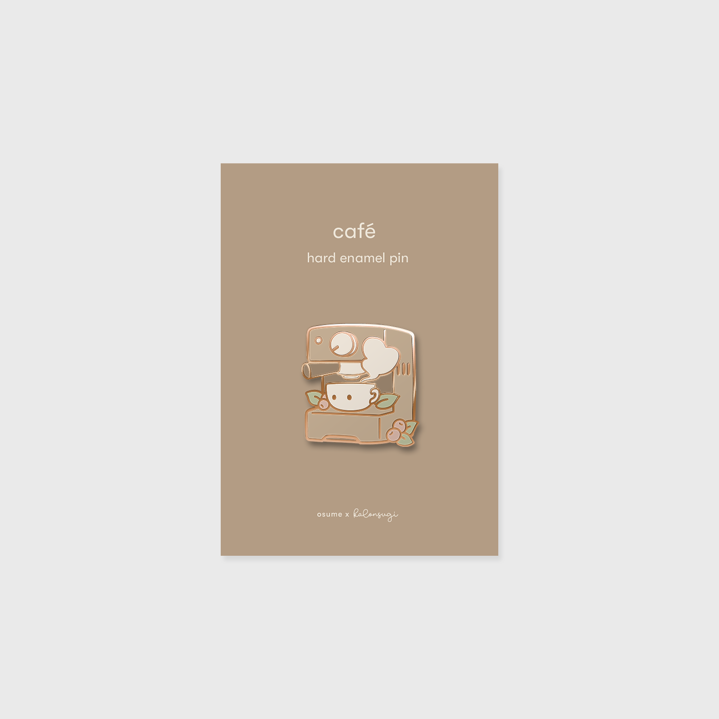 osume's cafe enamel pin in rose gold featuring a cute espresso machine.