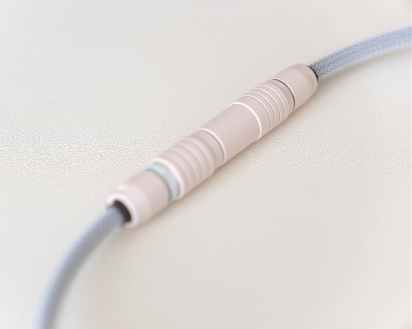 a closer look at the blush pink connector on the little ghost cable.