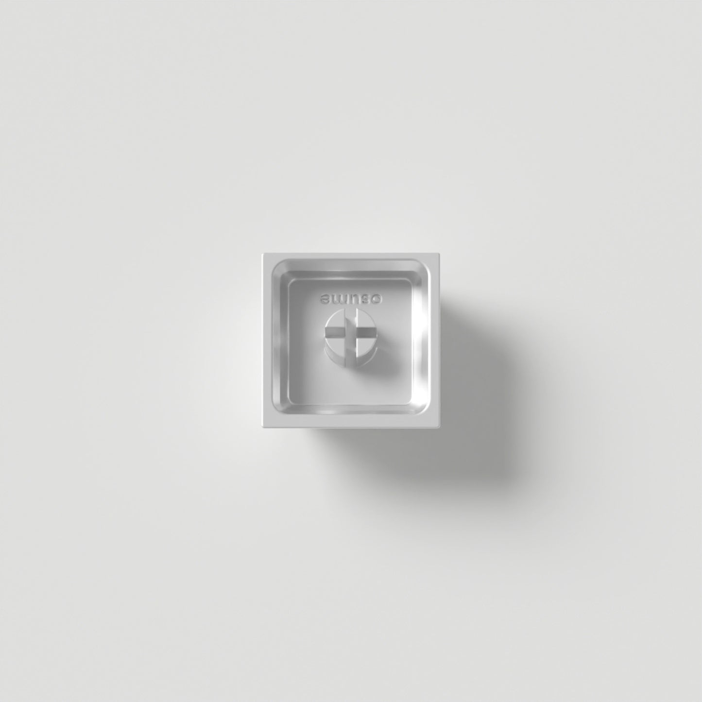 the underside of an osume metal artisan keycap.