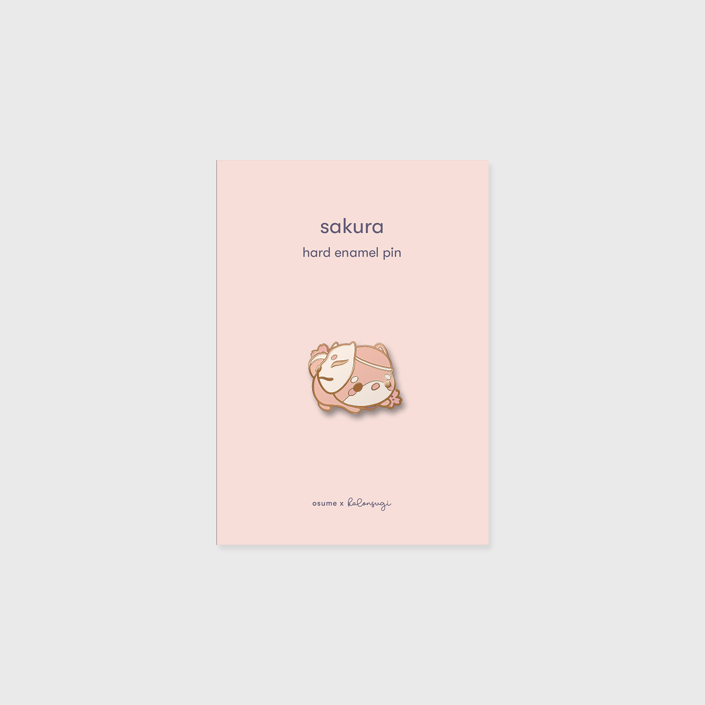 osume's sakura enamel pin in rose gold featuring a cute shiba with an inari mask.