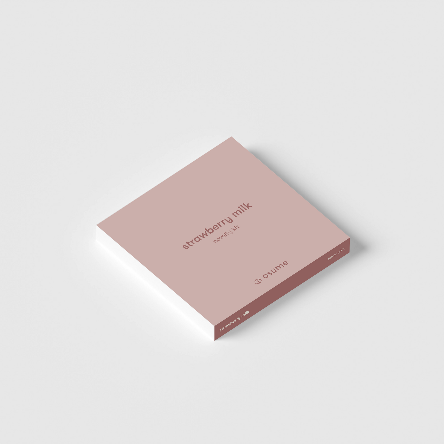the square packaging of the strawberry milk novelty kit.