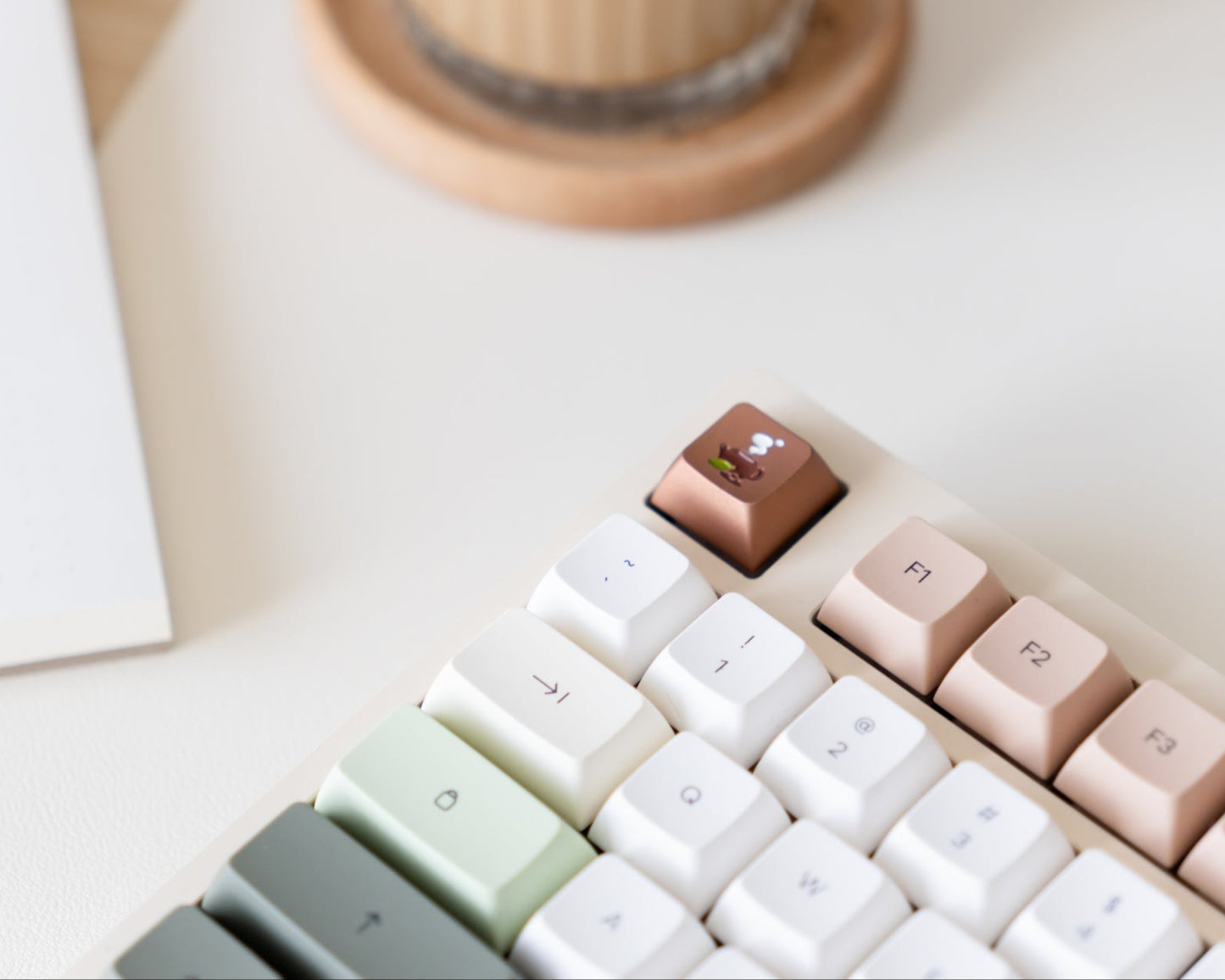 the zen metal artisan on a cream 75% keyboard.