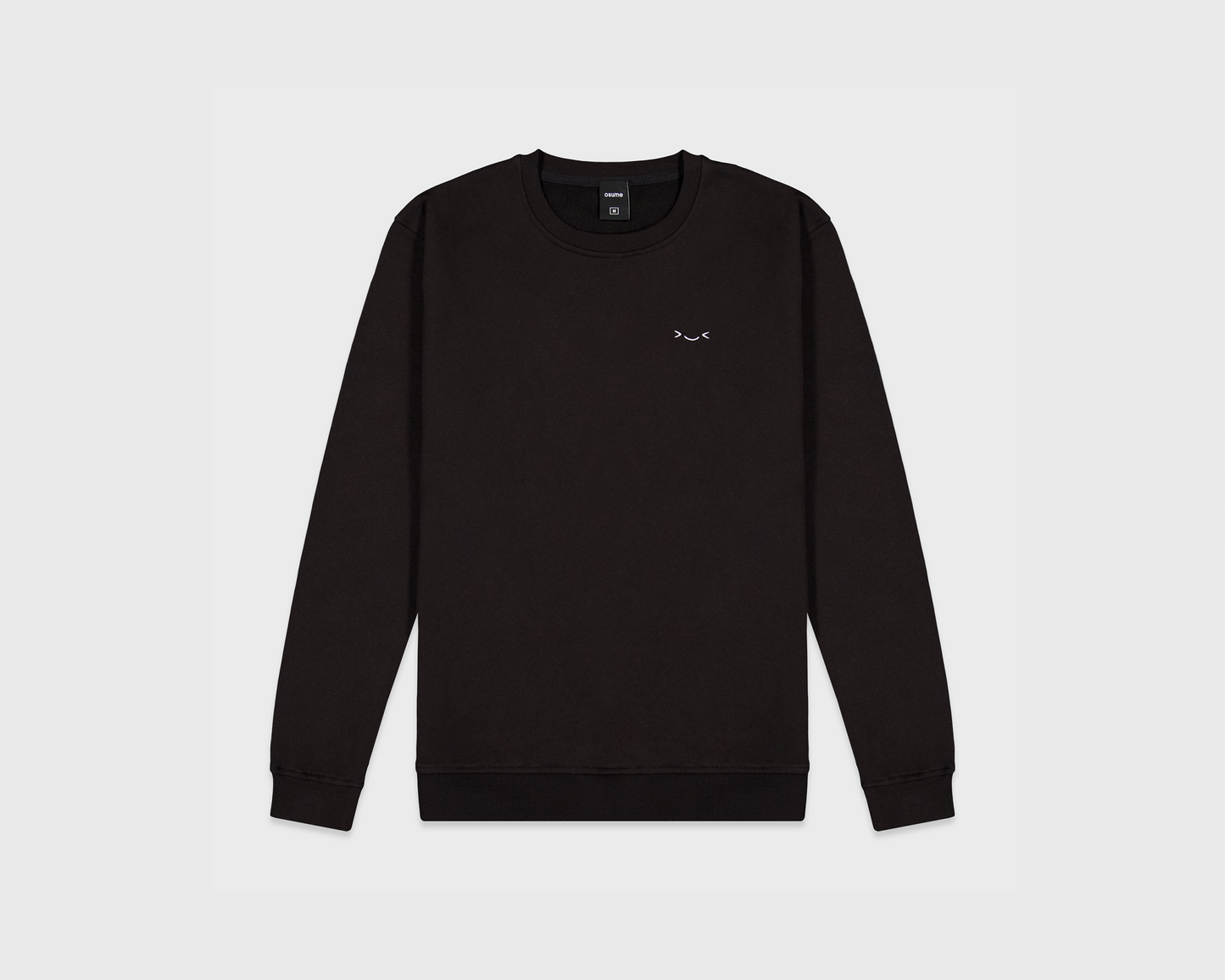 osume’s midweight crewneck in classic black featuring an embroidered white smiley face.