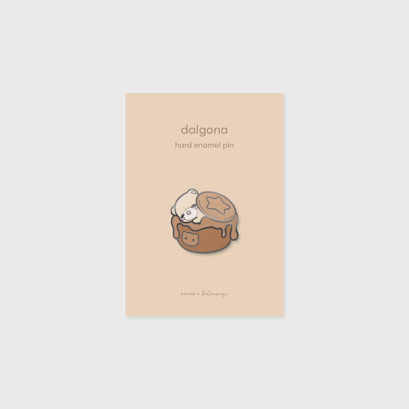 osume's dalgona enamel pin featuring a cute bear in dalgona coffee.