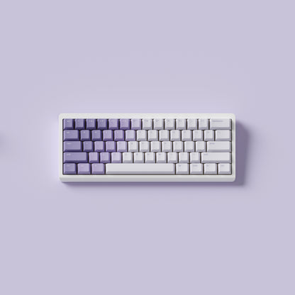 the standard bloom keycaps, in cherry profile, on a white 60% keyboard.