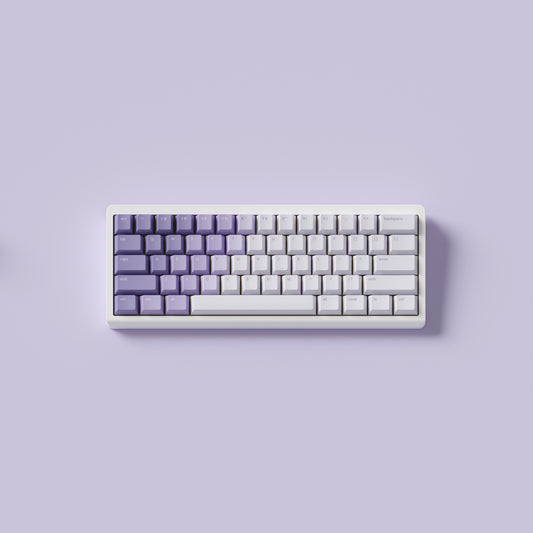 the standard bloom keycaps, in cherry profile, on a white 60% keyboard.