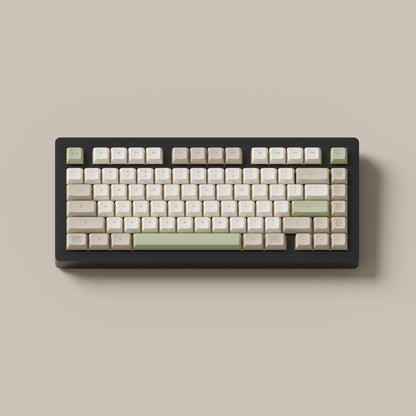 the cafe marshmallow keycaps with matching novelty keys on a black 75% keyboard.