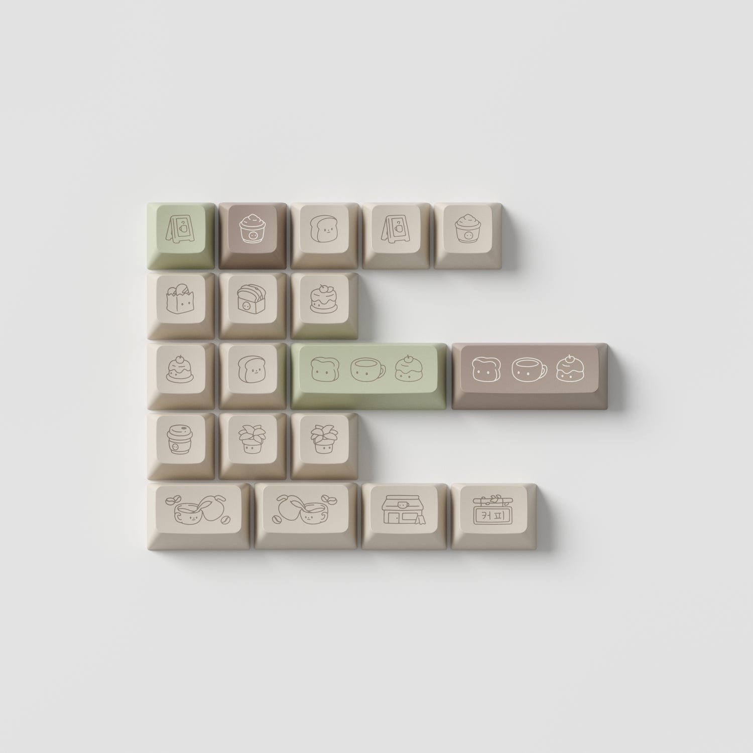 the standard edition cafe novelty keys in marshmallow profile. featuring cafe inspired artwork in spring green, roasted brown, and light stone colours.