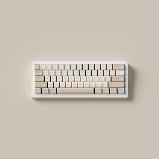 the cafe rose keycaps, in marshmallow profile, on a white 60% keyboard.
