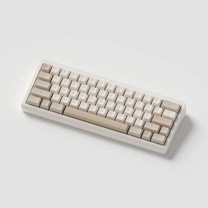 the cafe rose marshmallow keycaps with matching novelty keys on a cream 60% keyboard.