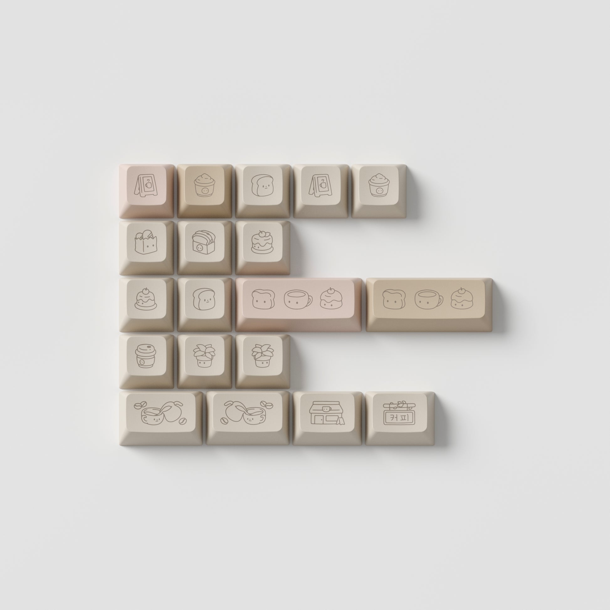 the standard edition cafe rose novelty keys in marshmallow profile. featuring cafe inspired artwork in macaron pink, caramel brown, and light stone colours.