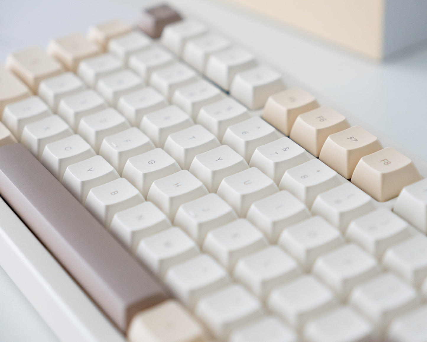 the dalgona keycaps in marshmallow profile on a white desk setup.