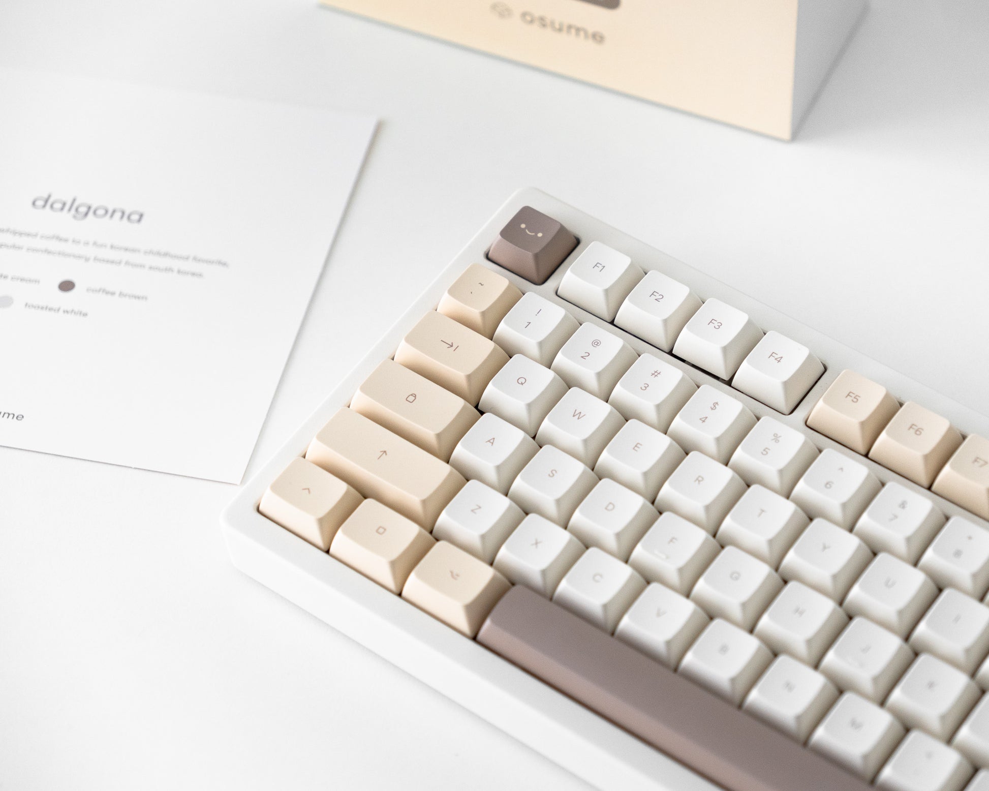 the dalgona keycaps in marshmallow profile on a white desk setup.