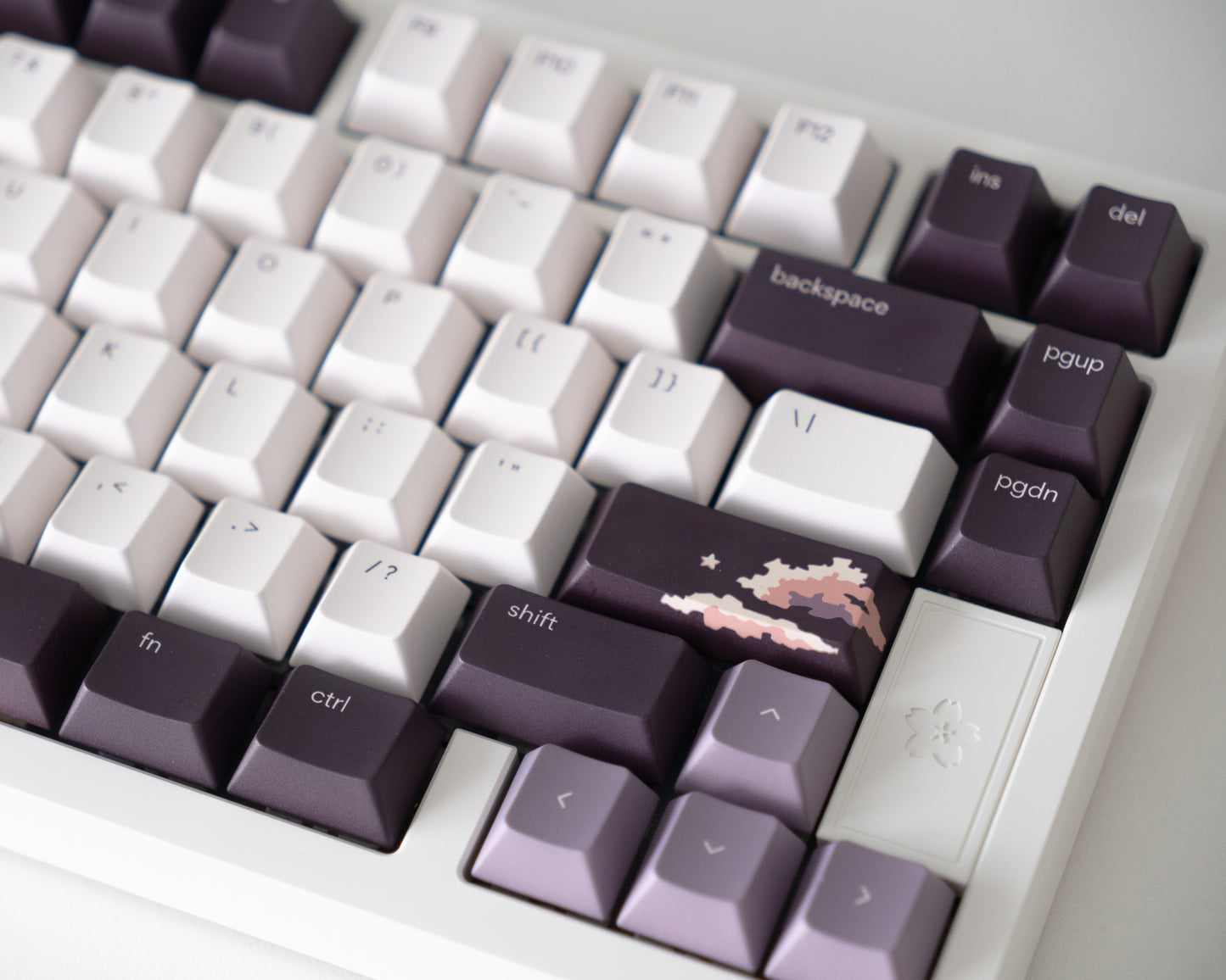 the dusk keycaps with special edition dusk novelty keys on a sakura play75 keyboard.