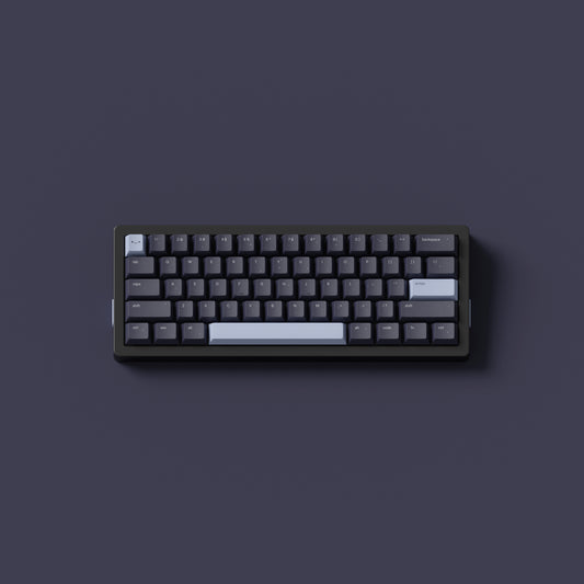 the standard horoscope keycaps, in cherry profile, on a black 60% keyboard.