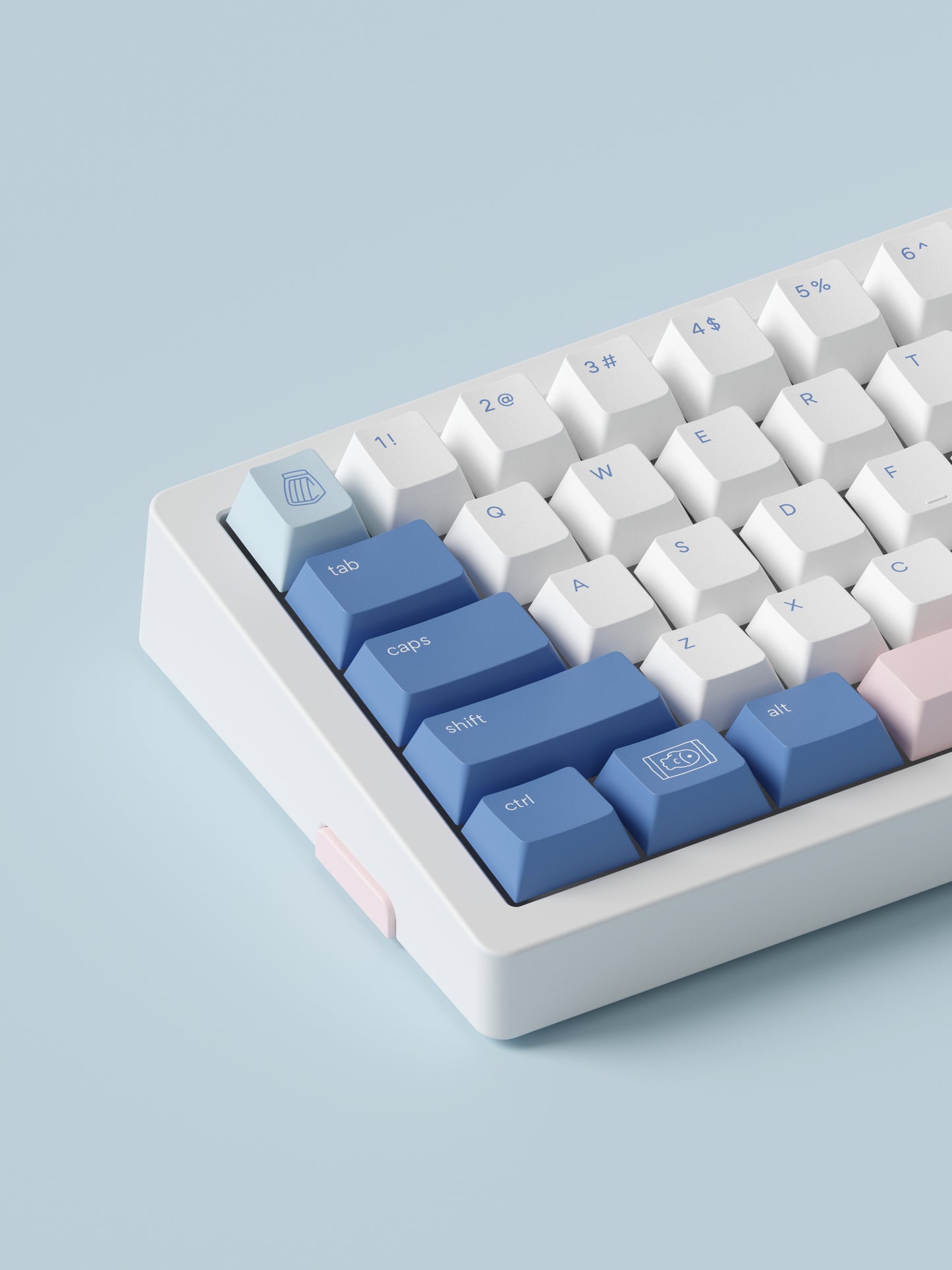the standard konbini blue keycaps, with novelty keys, on a white mono65 keyboard.