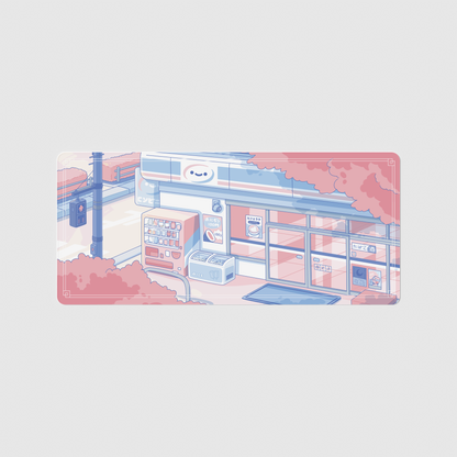 the 90x60cm special edition konbini blue desk mat with edge-stitched trim.