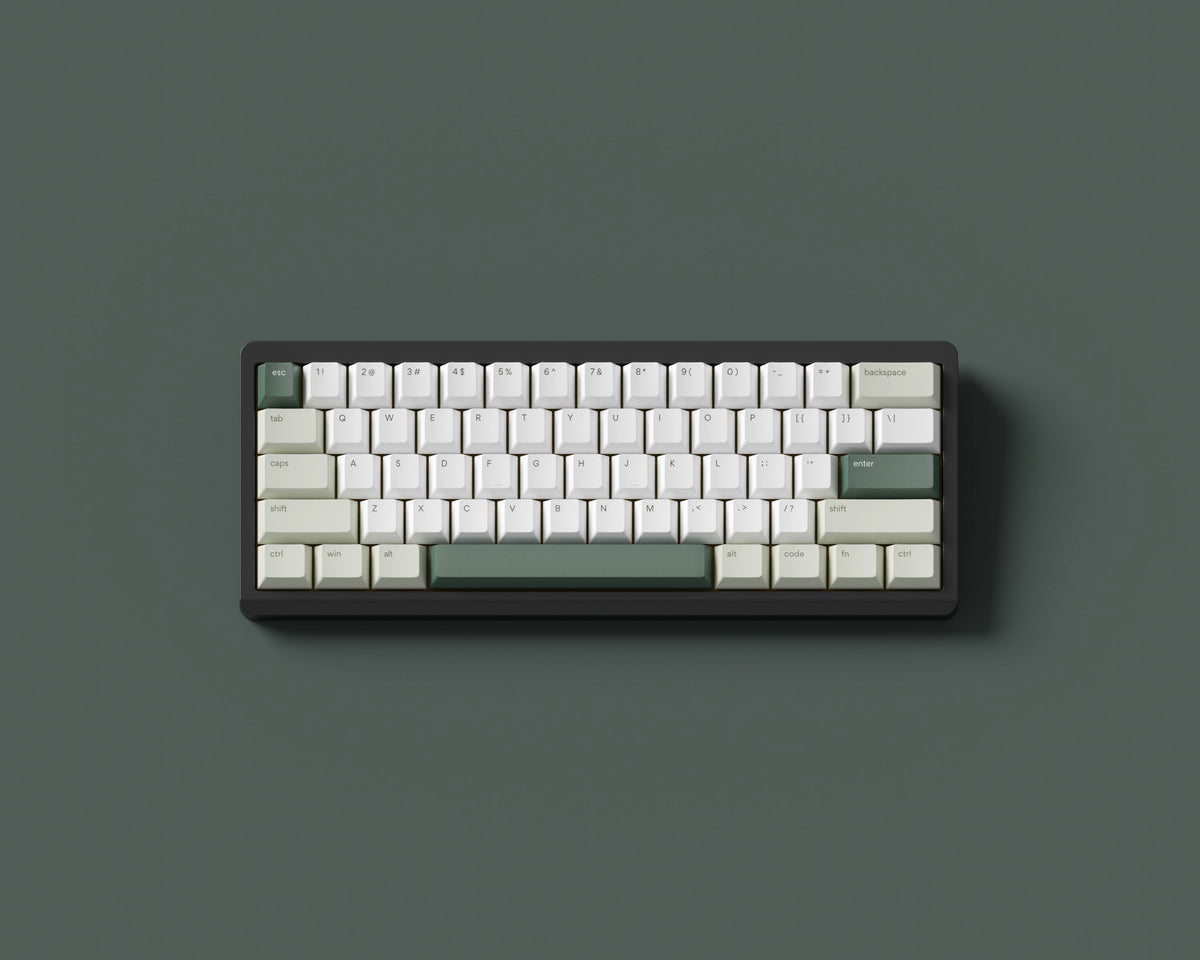 the matcha keycaps, in cherry profile, on a black 60% keyboard.
