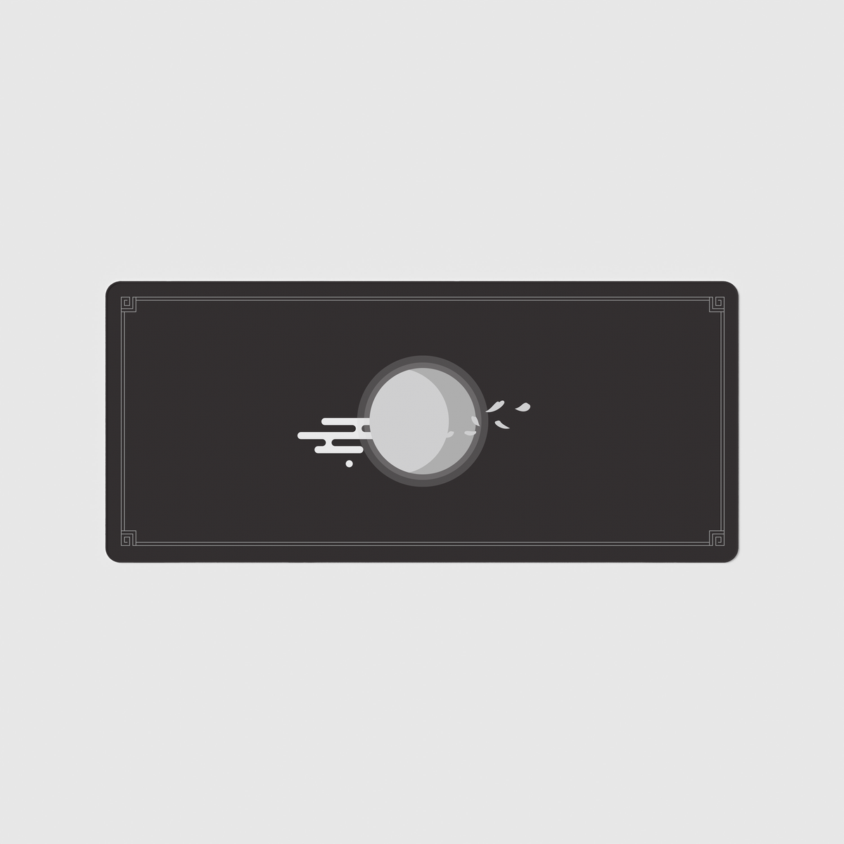 the 90x40cm midnight eclipse desk mat with edge-stitched trim.