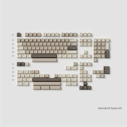 all the standard base kit mocha keycaps in cherry profile laid flat with almond cream, light mocha, and dark java colours.