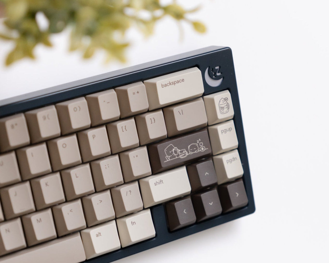 the mocha keycaps, in cherry profile, on the osume space navy nemui keyboard.