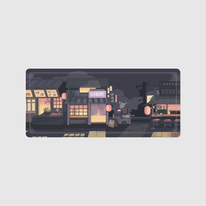 the 90x40cm special edition night market desk mat with edge-stitched trim.