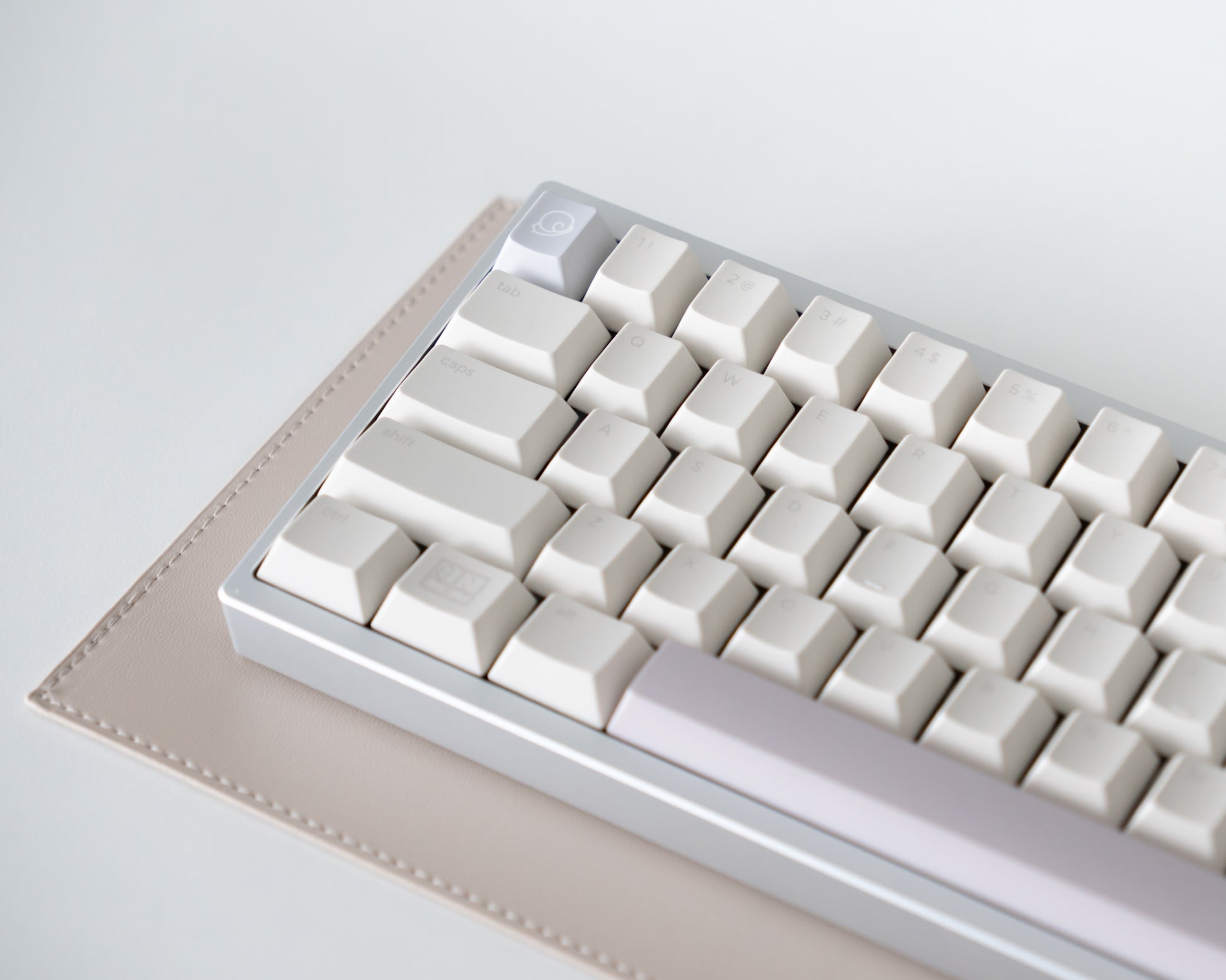 the standard rainy day keycaps with the rainy day novelty keys on top of osume's classic minimat.