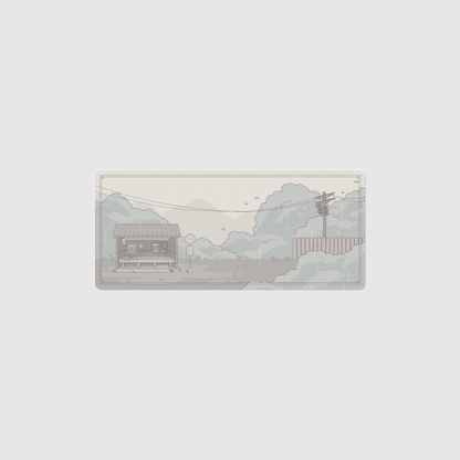 the 70x30cm special edition rainy day town desk mat with edge-stitched trim.