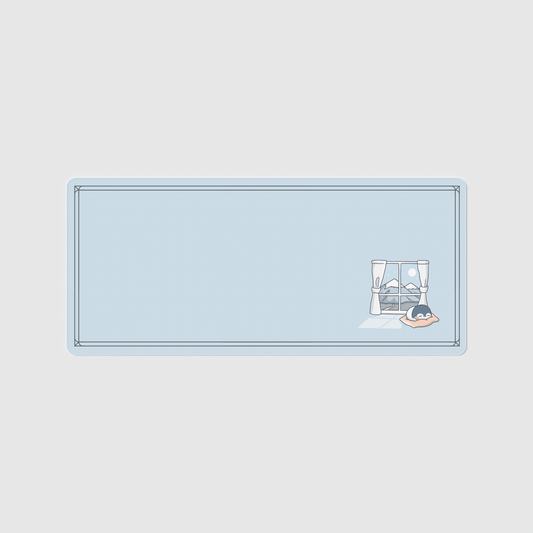 the 90x40cm standard edition winterglow desk mat with edge-stitched trim.